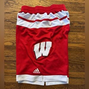 Adidas Men's Red Wisconsin Badgers basketball shorts.